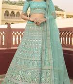 Turquoise sequins, resham, zari, dori, zarkan, gota, embroidered organza Semi Stitched Lehenga