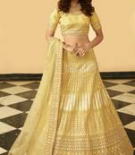 Yellow thread, zari, gota, zarkan, embroidered organza Semi Stitched Lehenga
