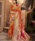 Orange woven banarasi silk saree with blouse