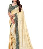 Beige Lycra sari with jacquard lace and jacquard blouse piece.