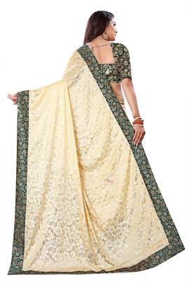 Beige Lycra sari with jacquard lace and jacquard blouse piece. 3