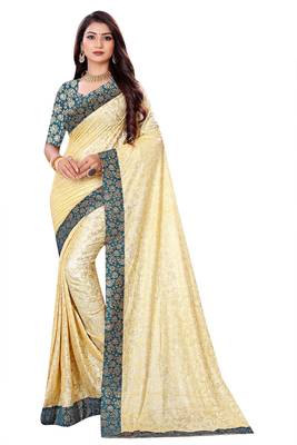 Beige Lycra sari with jacquard lace and jacquard blouse piece. 1
