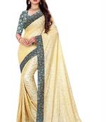 Beige Lycra sari with jacquard lace and jacquard blouse piece.