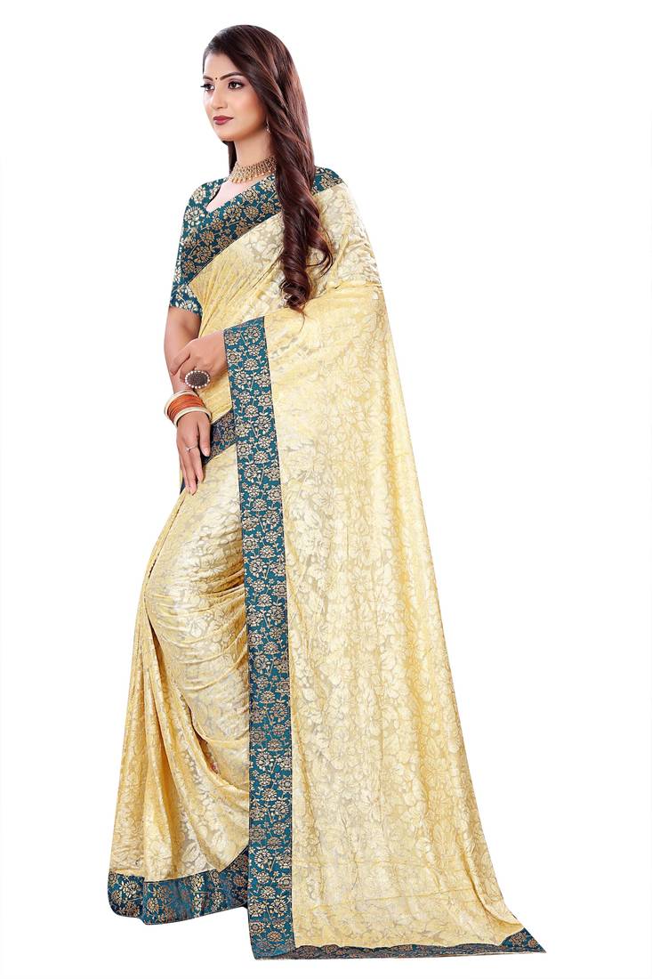 Beige Lycra sari with jacquard lace and jacquard blouse piece.