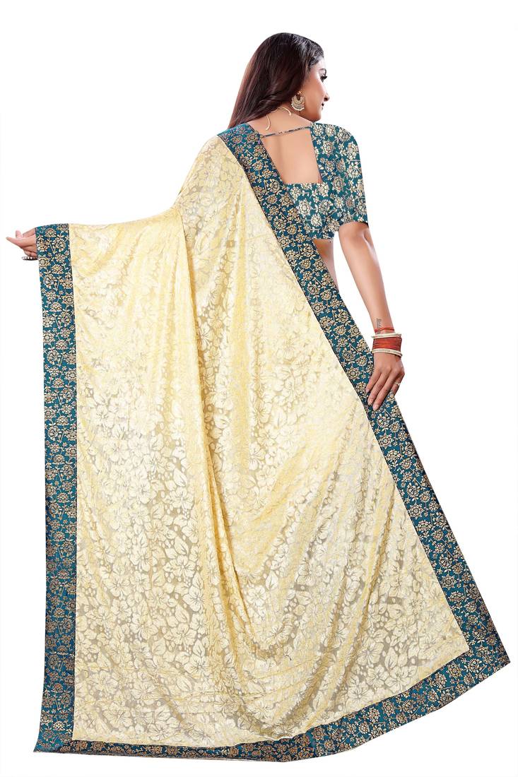 Beige Lycra sari with jacquard lace and jacquard blouse piece.