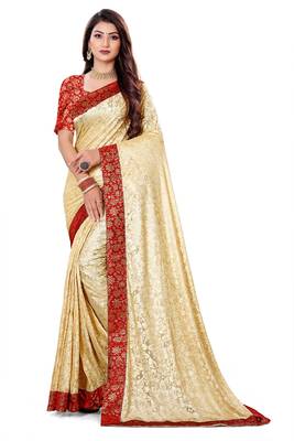 Beige Lycra sari with jacquard lace and jacquard blouse piece. 1