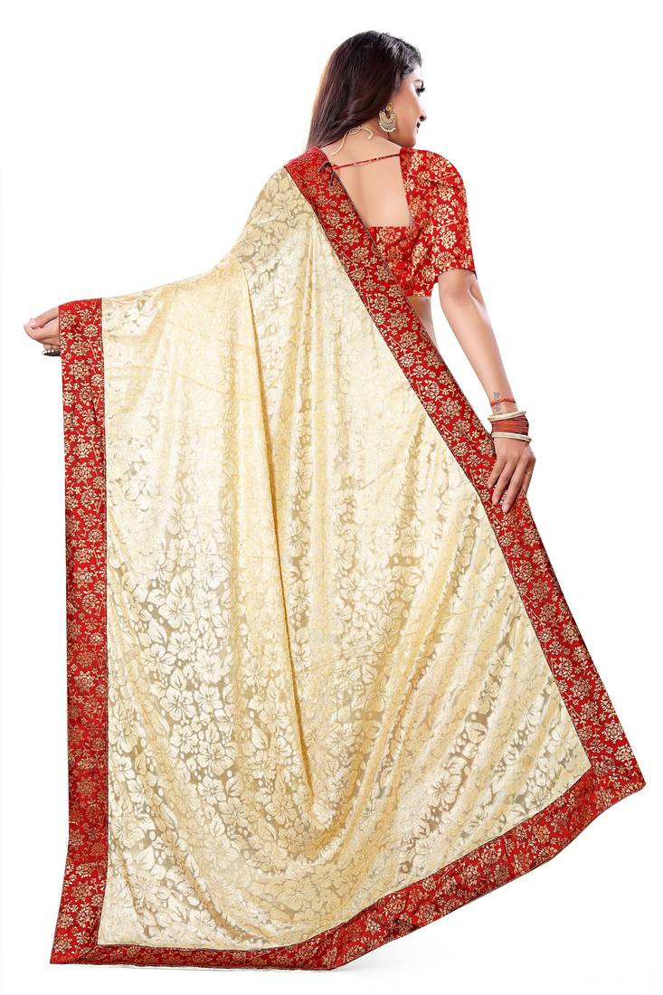 Beige Lycra sari with jacquard lace and jacquard blouse piece.