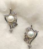 White pearl earrings