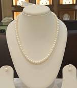 White pearl necklaces