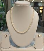 White pearl necklaces