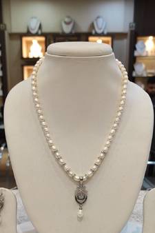 White pearl necklaces