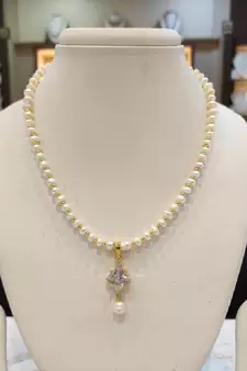 White pearl necklaces