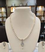 White pearl necklaces