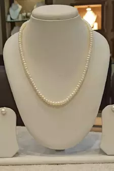 White pearl necklaces