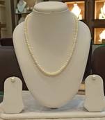 White pearl necklaces