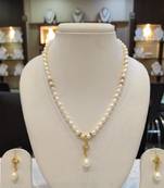 White pearl necklaces
