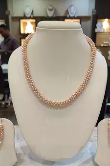 Pink pearl necklaces