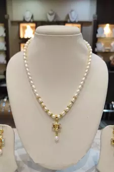 White pearl necklaces
