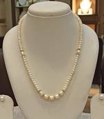White pearl necklaces