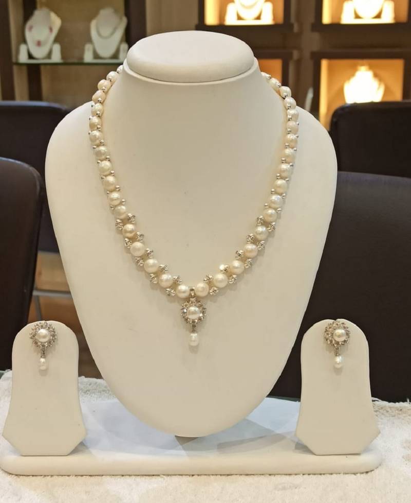 White pearl necklaces