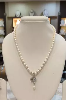 White pearl necklaces