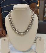 Grey pearl necklaces