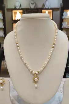 White pearl necklaces