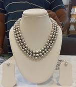 Grey pearl necklaces