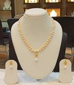 White pearl necklaces