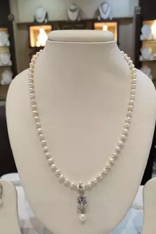 White pearl necklaces