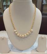 White pearl necklaces