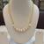 White pearl necklaces
