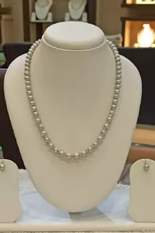 Grey pearl necklaces