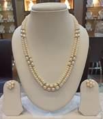 White pearl necklaces