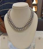 Grey pearl necklaces