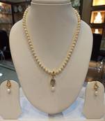 White pearl necklaces