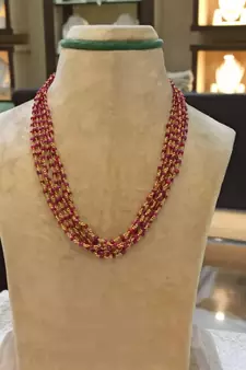 Maroon necklaces