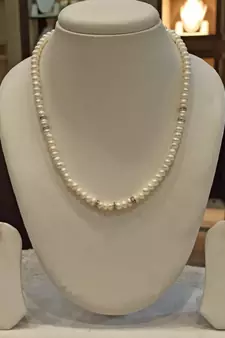 White pearl necklaces