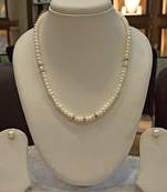 White pearl necklaces