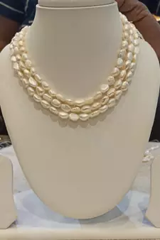 White pearl necklaces