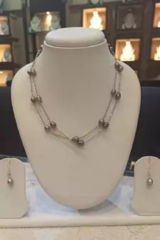 Grey pearl necklaces