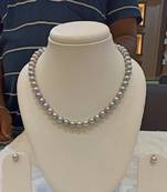 Grey pearl necklaces