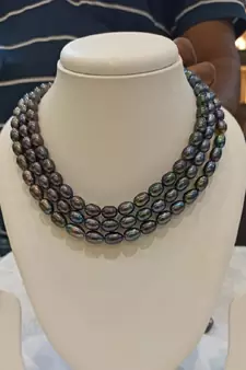 Grey pearl necklaces