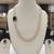 White pearl necklaces
