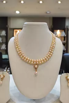Pink pearl necklaces