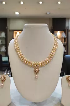 Pink pearl necklaces