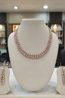 Pink pearl necklaces