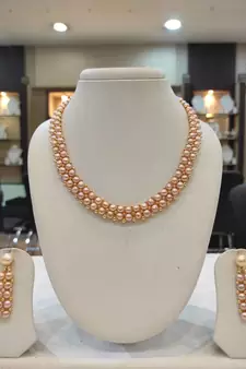 Pink pearl necklaces