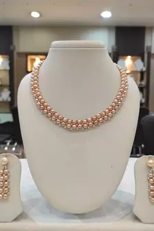 Pink pearl necklaces