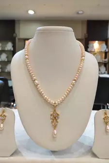 White pearl necklaces